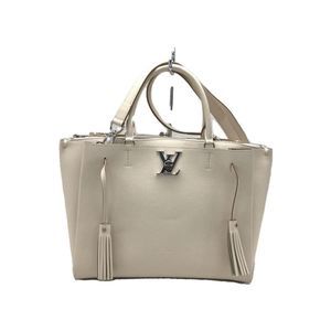 Louis Vuitton Lock Me Leather Ivory Shoulder Bag